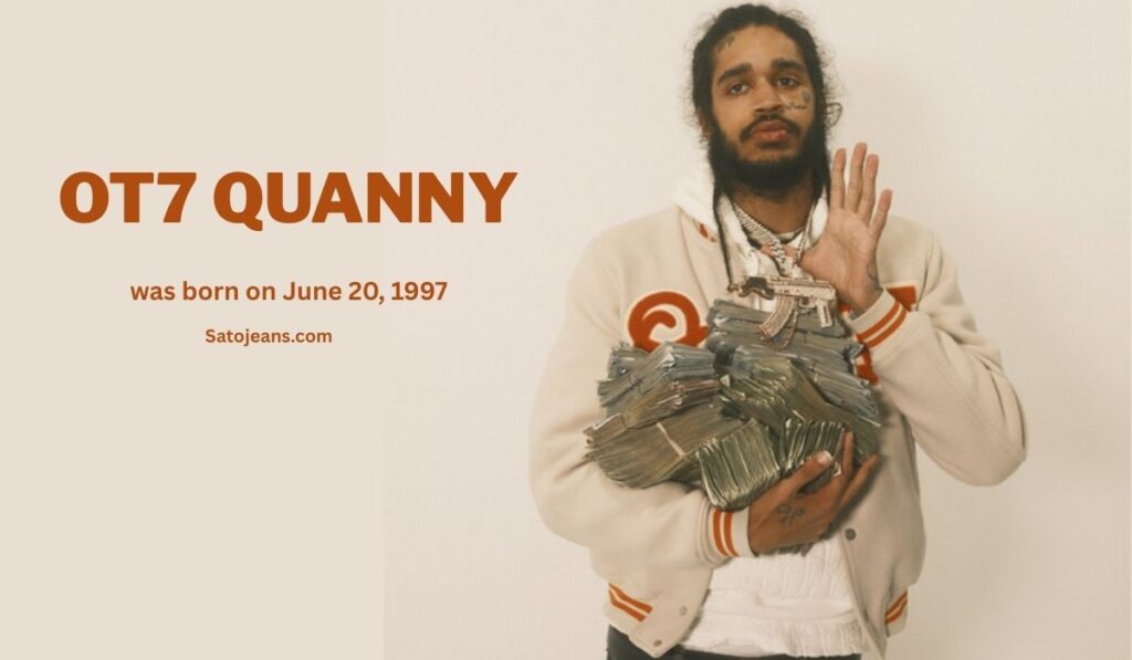 A promotional image for the artist OT7 Quanny age and the clothing brand Sato Jeans. The rapper, a young Black man, is the central focus of the photo. Below him, stylized text displays his birthdate, "was born on June 20, 1997," and the website "Satojeans.com" is prominently featured.